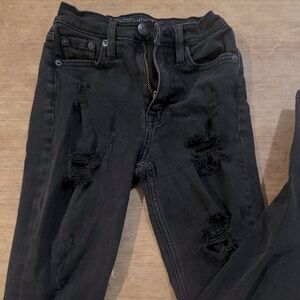 Black distressed, skinny jeans